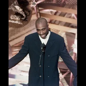 Feb 28, 1996; Los Angeles, CA, USA ; FILE PHOTO; Music entertainer Tupac Shakur presents an award at the 38th Annual Grammy