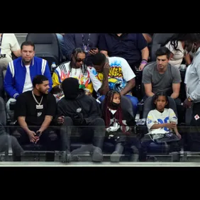 Feb 13, 2022; Inglewood, California, USA; American rappers 2 Chainz, YG, Tyga, Justin Laboy and Kanye West, with his children
