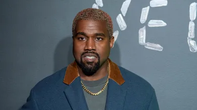 : Kanye West attends the the Versace fall 2019 fashion show at the American Stock Exchange Building in lower Manhattan on December 02, 2018 in New York City