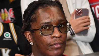 Rapper Young Thug attends the game between the Phoenix Suns and the Atlanta Hawks at State Farm Arena.