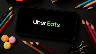 In this photo illustration a Uber Eats logo seen displayed