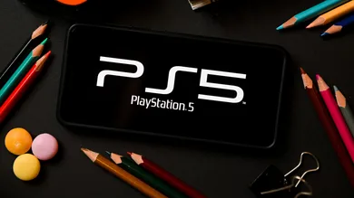 In this photo illustration a PlayStation 5 logo seen