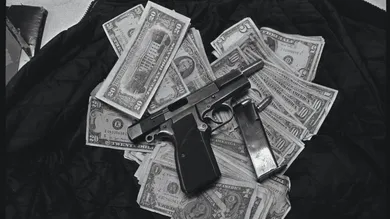 Gun and Money Collected by Gang Squad