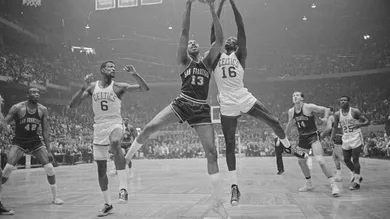 Wilt Chamberlain and Bill Russell Fighting for Rebound