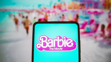 In this photo illustration, the Barbie the movie logo seen