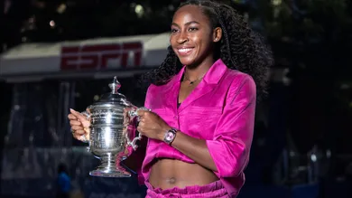Coco Gauff wearing dress by Ganni, winner of women's
