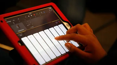 A student uses the GarageBand application on a iPad to make music during a "Girls On The Mic" class at the Women's Audio Mission studio on Thursday, Sept. 14, 2017, in Oakland, Calif. Women's Audio Mission is a San Francisco-based non-profit whose missio