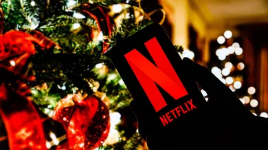 In this photo illustration the Netflix logo seen displayed