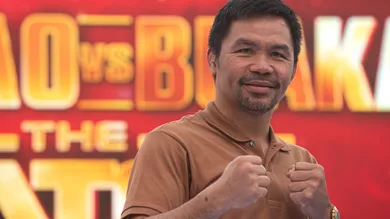 Manny Pacquiao, a Filipino boxer poses for a photo to the