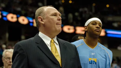 DENVER,CO--MARCH 16TH 2005--Denver Nugget Head Coach George Karl and Nugget star Carmelo Anthony wait for introductions before the game against the Charlotte Bobcats at Pepsi Center. THE DENVER POST/ ANDY CROSS