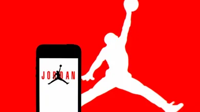 In this photo illustration, an Air Jordan logo seen