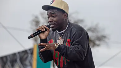 Top Dawg Entertainment (TDE) throws its 10th annual toy drive and concert featuring SZA, Jay Rock, YG and other TDE artists performing followed by a gift giveaway to kids in the Nickerson Gardens housing projects