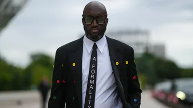 Street Style - Paris Fashion Week - Haute Couture Fall/Winter 2021/2022 : Day One