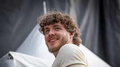 Louisville rap artist Jack Harlow smiled while looking over the crowd during the Rich Homie Quan set on the Garden stage at the