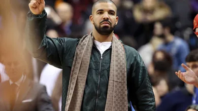 Mar 4, 2016; Toronto, Ontario, CAN; Toronto Raptors ambassador and rap artist Drake celebrates a basket by his team against the