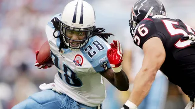 Tennessee Titans running back Chris Johnson (28) runs for good yardages against the Houston Texans at LP Field in Nashville on