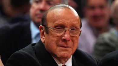 Nov 10, 2014; New York, NY, USA; Music executive and producer Clive Davis watches the fourth quarter between the Atlanta Hawks