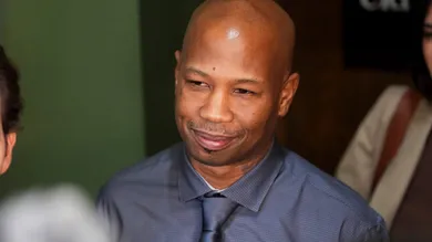 Hernandez Govan smiles while speaking to the media after he was found not guilty on all charges regarding his possible role in