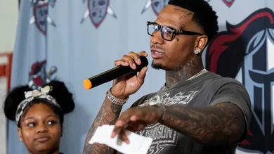 Rapper Moneybagg Yo answers a question from a student after donating $20,000 to the Memphis-Shelby County Schools Adolescent