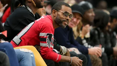 Dec 18, 2018; Atlanta, GA, USA; Entertainer Lil Duval watches a game between the Washington Wizards and Atlanta Hawks in the