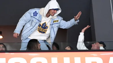 Nov 24, 2021; Los Angeles, California, USA; Canadian singer Justin Bieber celebrates after the Toronto Maple Leafs scored a goal