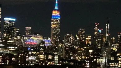 The Empire State Building lit up blue and orange Wednesday night after the Mets won their National League Division Series on
