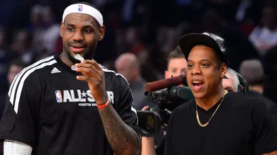 Feb 17, 2013; Houston, TX, USA; Eastern Conference forward LeBron James (left) of the Miami Heat greets recording artist Jay-Z