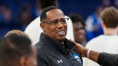 Percy Master P Miller, rapper and president of basketball operations at New Orleans, greets Memphis mens basketball coach