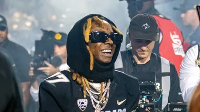 Lil Wayne comes out of the CU football locker room to give a live pregame performace before the Rocky Mountain Showdown on Sept.