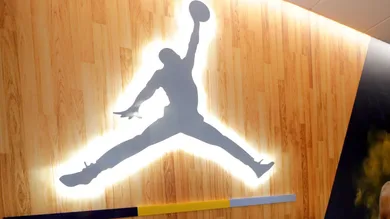 A hallway of the locker room, leading to the coaches office features an Air Jordan logo. The Marquette mens' basketball team
