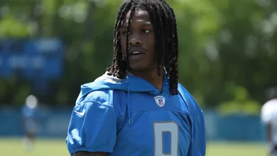 Lions wide receiver Jameson Williams walks off the field after OTAs.