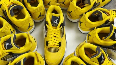 Air Jordan 4 Retro Lightning sneakers sit on a display at Coastal Kicks in Mary Esther. The shoe was one of the more popular