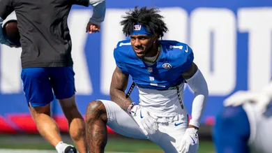 New York Giants wide receiver Malik Nabers (1) stretches during a week 6 NFL football game between New York Giants and New