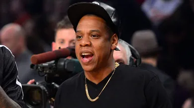 Feb 17, 2013; Houston, TX, USA; Eastern Conference forward LeBron James (left) of the Miami Heat greets recording artist Jay-Z