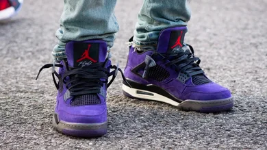Image via <a href='http://www.nicekicks.com/travis-scott-x-air-jordan-4-purple-suede-closer-look/' rel="nofollow noopener" target='_blank'>Gabe Oshin/Nice Kicks</a>