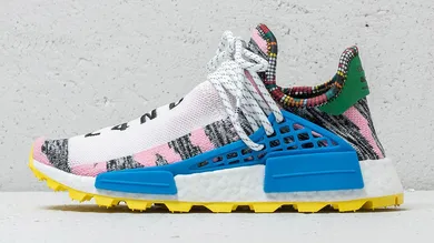 Image Via <a href='https://sneakernews.com/2018/08/14/where-to-buy-pharrell-adidas-nmd-solar-hu-collection/' rel="nofollow noopener" target='_blank'>SneakerNews</a>