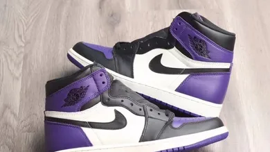 Image Via <a href='https://sneakerbardetroit.com/air-jordan-1-court-purple-555088-501-release-date/' rel="nofollow noopener" target='_blank'>SBD</a>