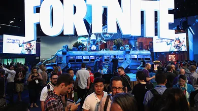 Game enthusiasts and industry personnel visit the 'Fortnite' exhibit during the Electronic Entertainment Expo E3 at the Los Angeles Convention Center on June 12, 2018 in Los Angeles, California.