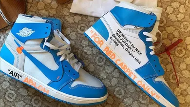 Image Via <a href='https://sneakerbardetroit.com/unc-off-white-air-jordan-1-release-date/' rel="nofollow noopener" target='_blank'>SBD</a>
