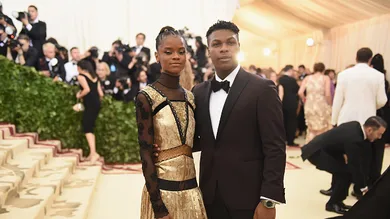 Actors Letitia Wright and John Boyega attend the Heavenly Bodies: Fashion & The Catholic Imagination Costume Institute Gala at The Metropolitan Museum of Art on May 7, 2018 in New York City.