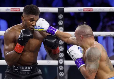 TOPSHOT-BOX-HEAVY-UKR-GBR-USYK-JOSHUA