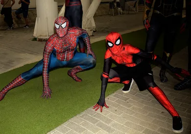 Spiderman cosplayers pose during the 29th edition of Romics