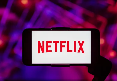In this photo illustration, the Netflix logo is seen