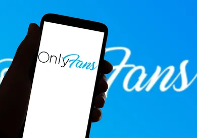 In this photo illustration, the Onlyfans app logo is on the