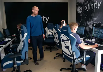 Phil Aram, manager of the Evil Geniuses Dota 2 esports team, watches his players practice at its home base - a house in a subdivision in Alameda, Calif. on Tuesday, Nov. 29, 2016