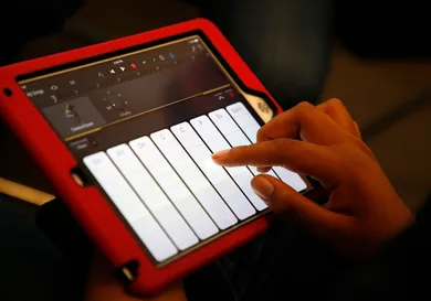 A student uses the GarageBand application on a iPad to make music during a "Girls On The Mic" class at the Women's Audio Mission studio on Thursday, Sept. 14, 2017, in Oakland, Calif.  Women's Audio Mission is a San Francisco-based non-profit whose missio