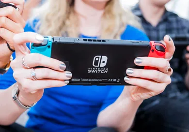 People Playing A Nintendo Switch