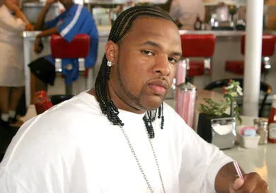 Pharrell Williams and Lil' Kim Sighting on Collins Avenue - August 27, 2004