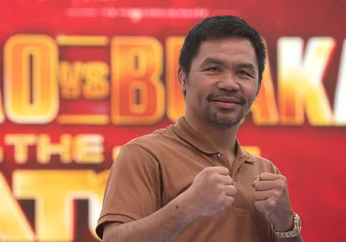 Manny Pacquiao, a Filipino boxer poses for a photo to the