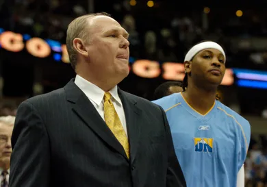 DENVER,CO--MARCH 16TH 2005--Denver Nugget Head Coach George Karl and Nugget star Carmelo Anthony wait for introductions before the game against the Charlotte Bobcats at Pepsi Center. THE DENVER POST/ ANDY CROSS